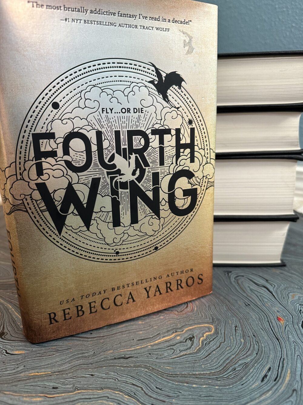 Fourth Wing Book and Book Stack