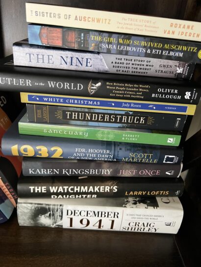 stack of books on bookshelf
