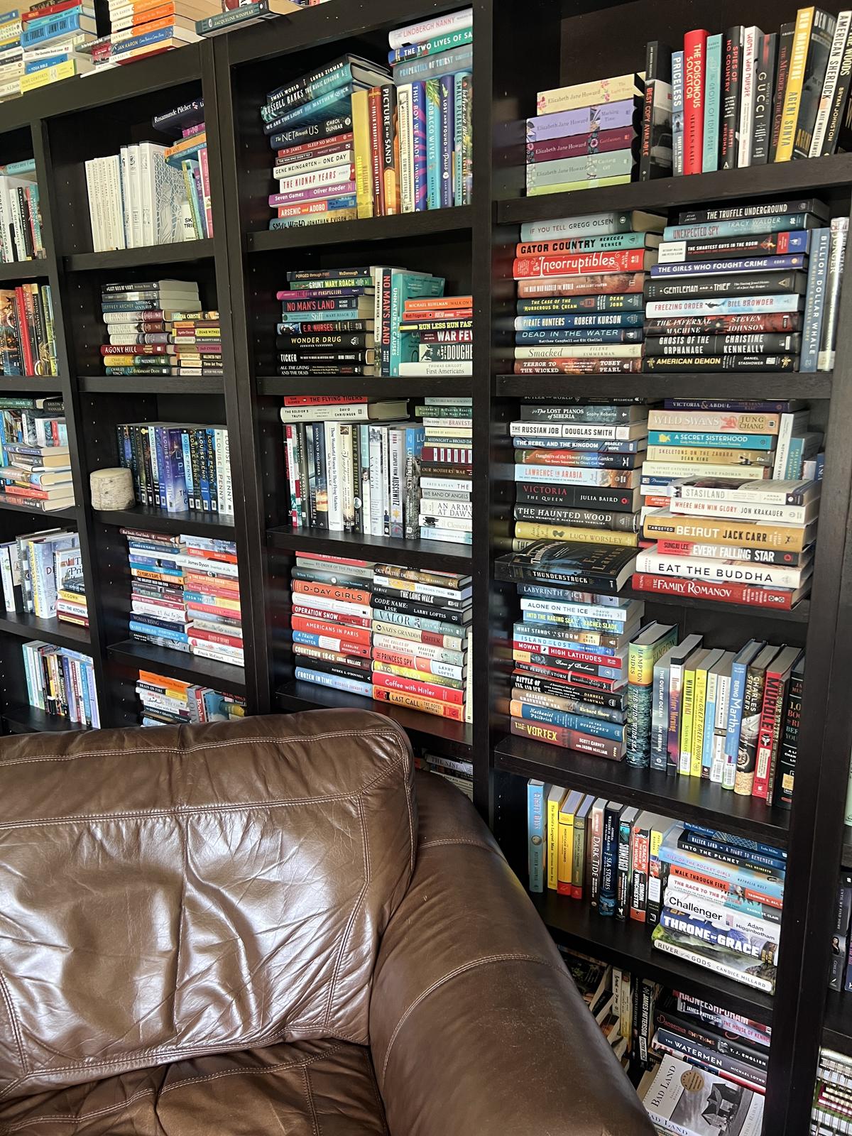 books on a black bookshelf