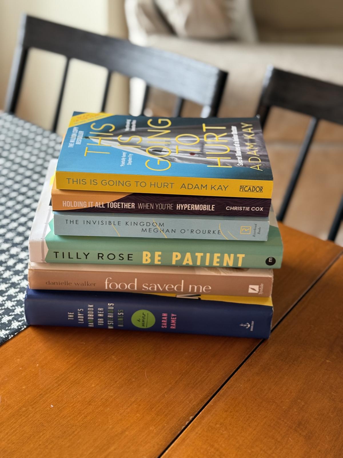 A stack of medical memoir books