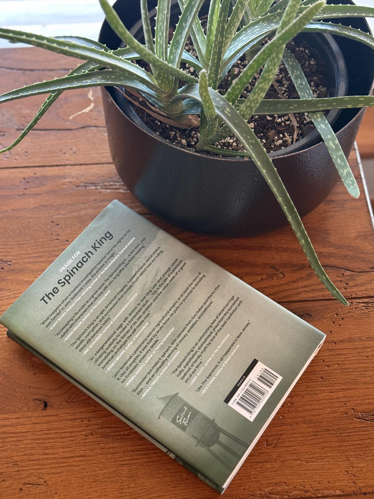 The Spinach King book back cover on table