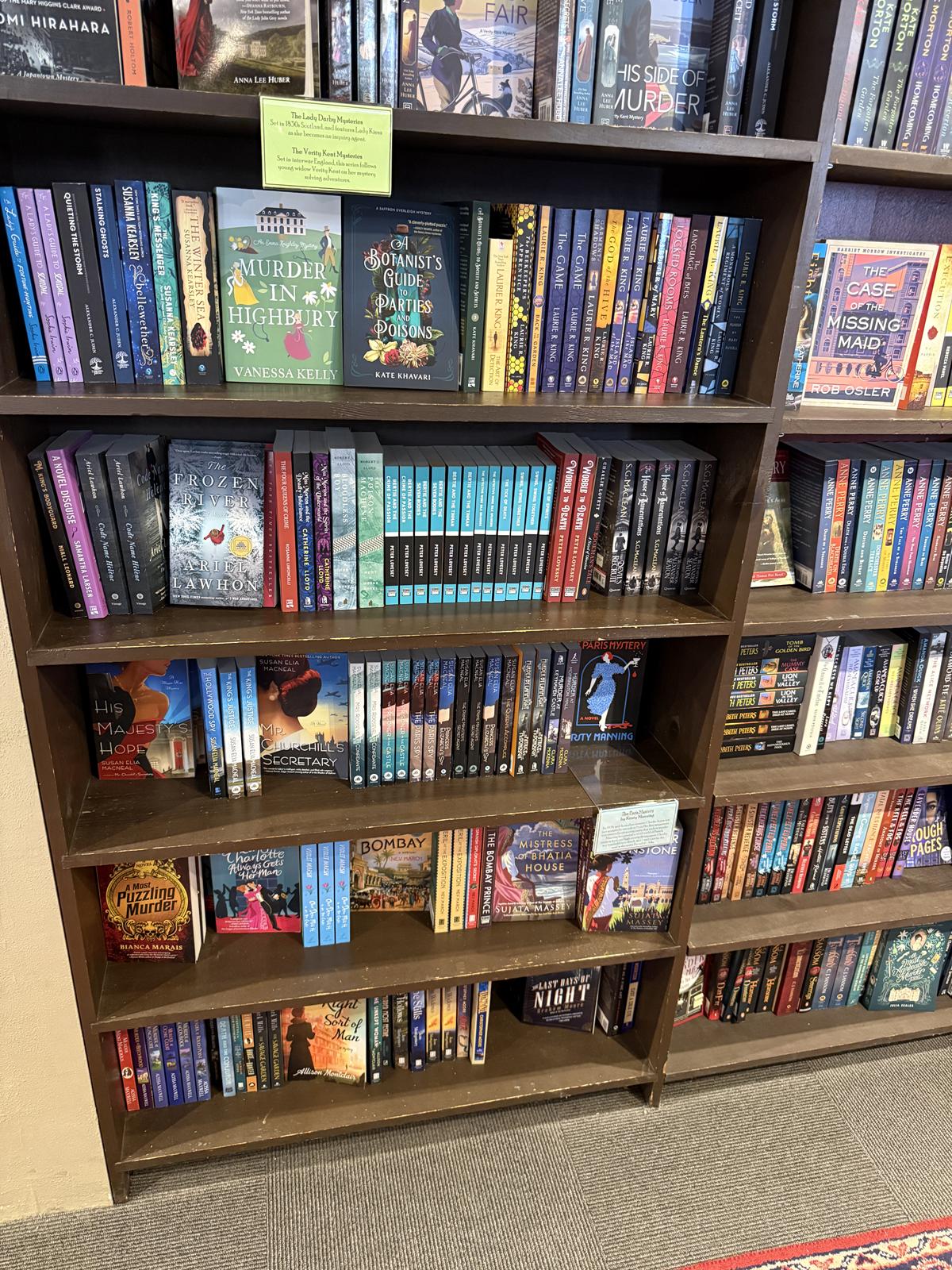 Murder By the Books bookstore bookshelf