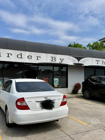 Outside of Murder by the Book Bookstore