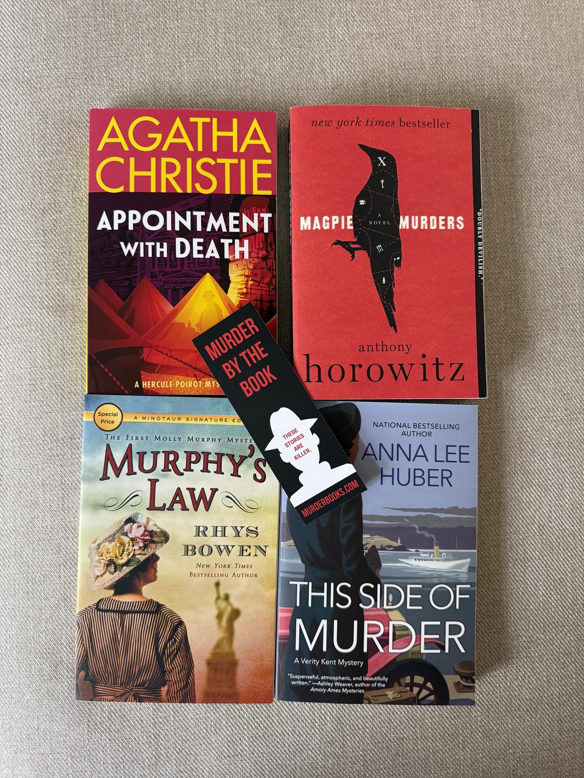 four books I bought at Murder By the Book