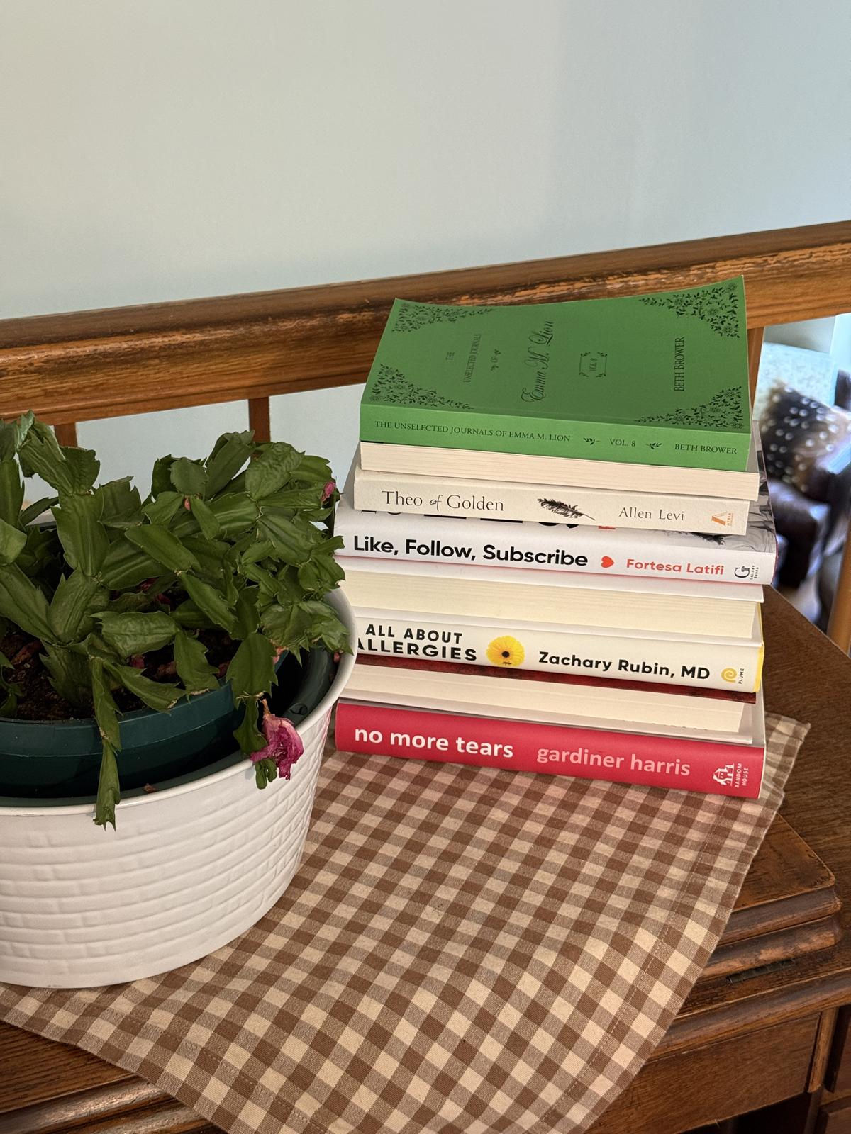 a stack of the best books so far of 2026
